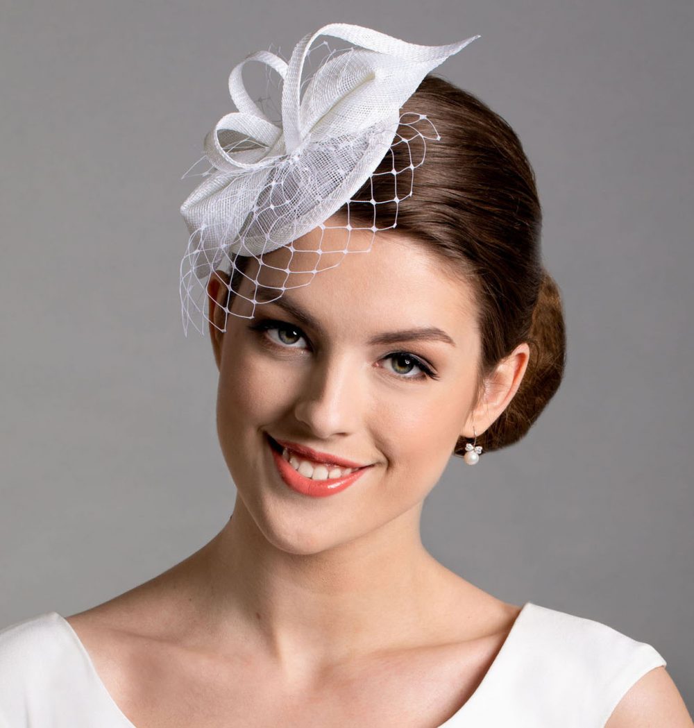 Marge Iilane White fascinator hat for women.