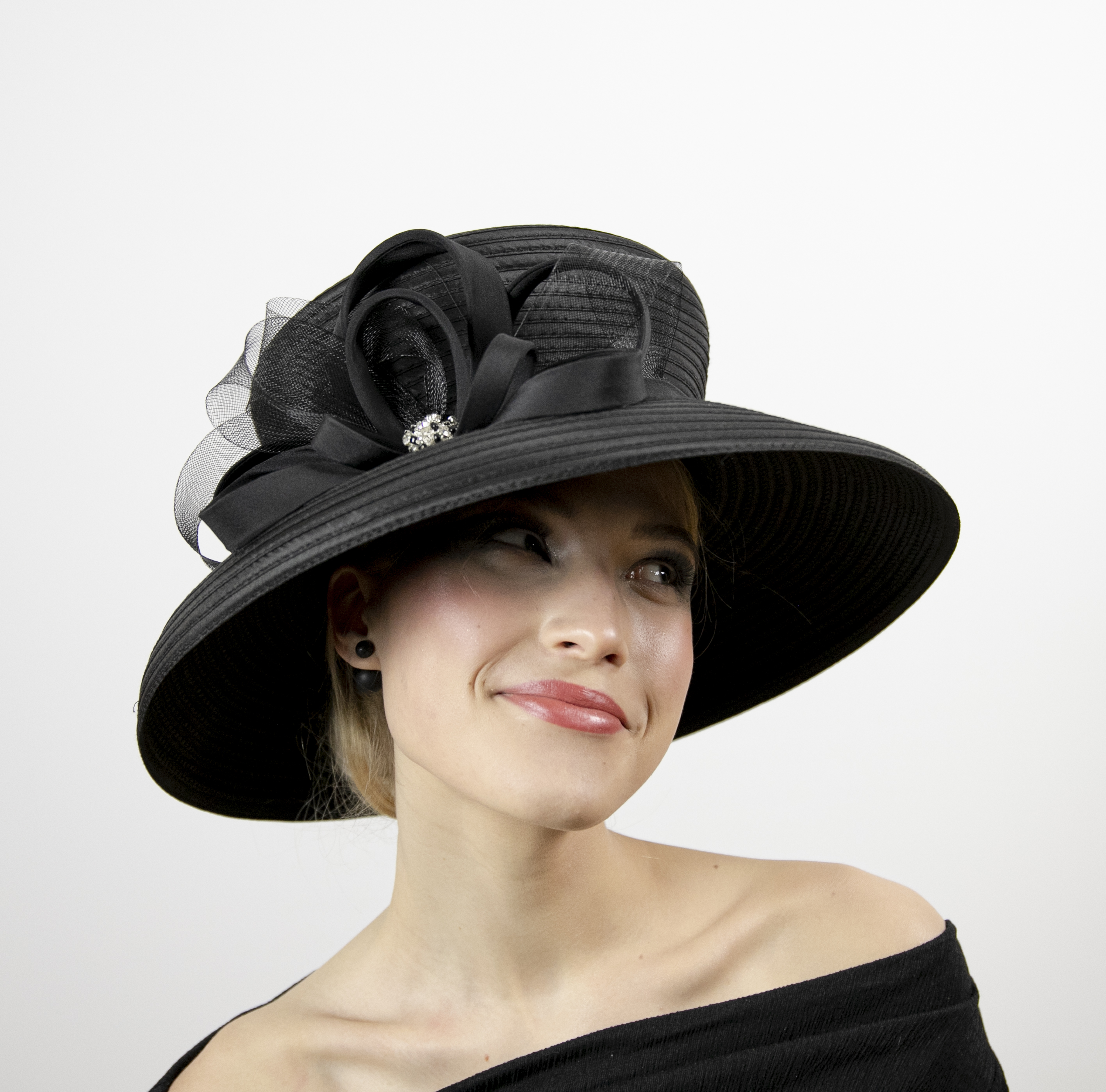 Black wide brim hat to wear at funerals, weddings, races.