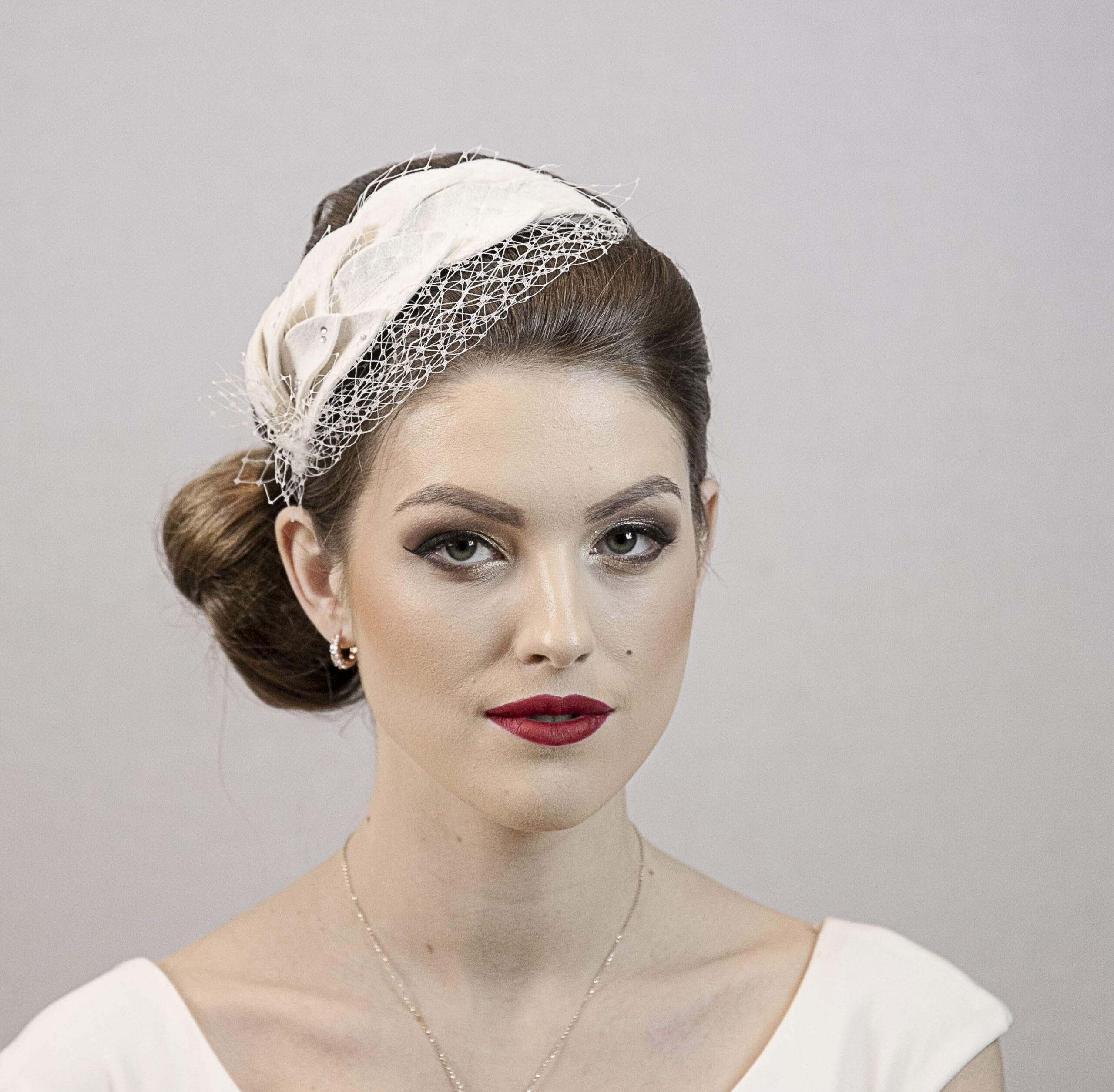Ivory white bridal headpiece. Wedding hat.
