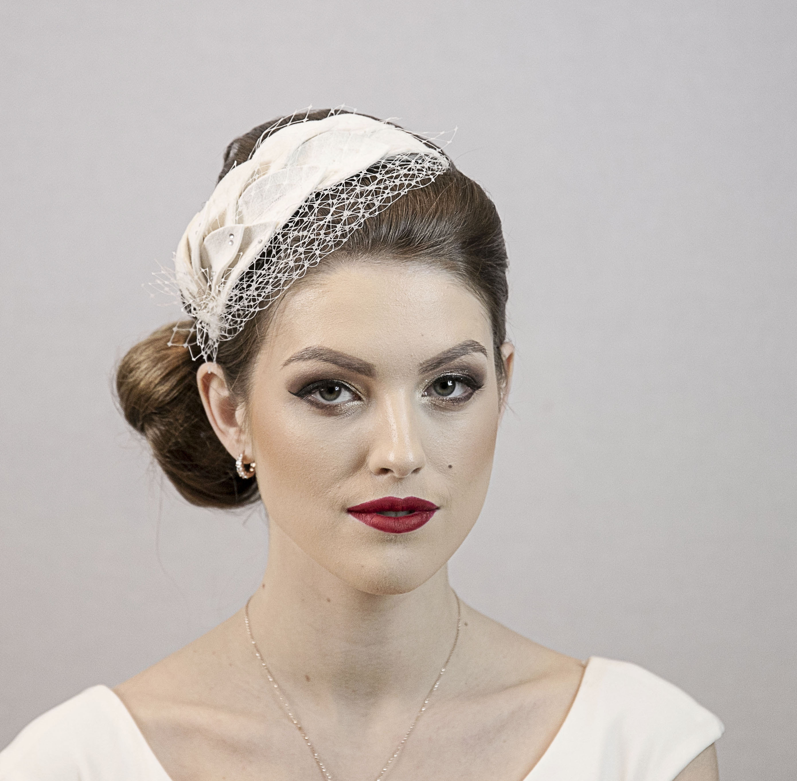 Ivory white bridal headpiece. Wedding hat.