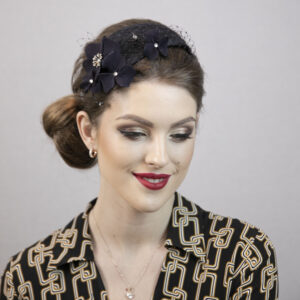 Blue floral fascinator. Dark blue wedding hat.