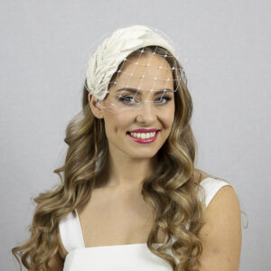 Ivory white bridal hat with net. Wedding fascinator hat.