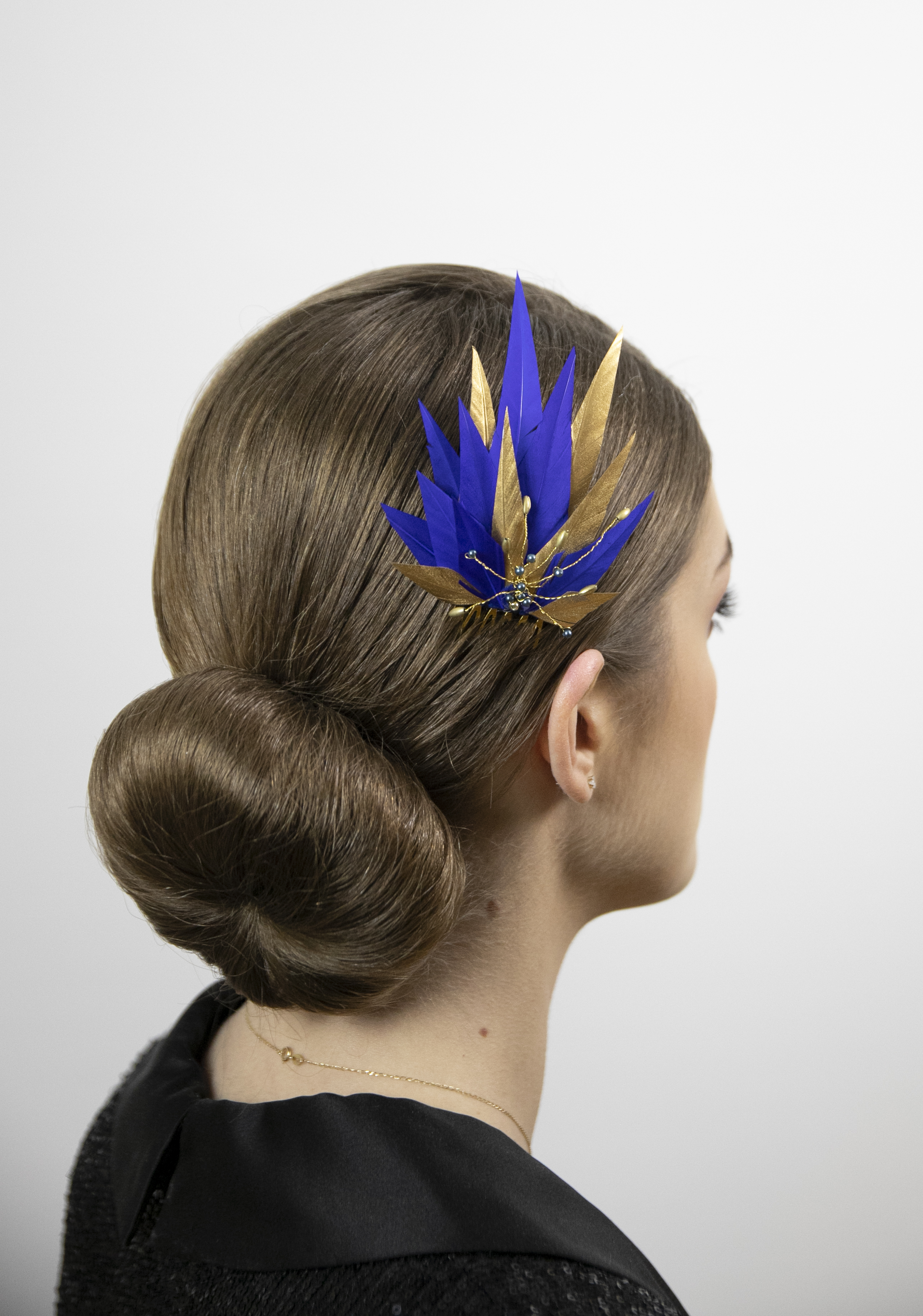 Royal blue and golden feather fascinator