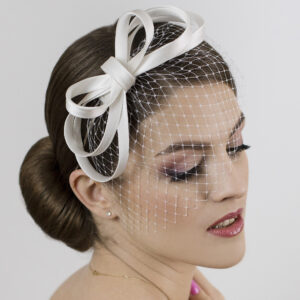White wedding fascinator. Bridal fascinator with face veil.