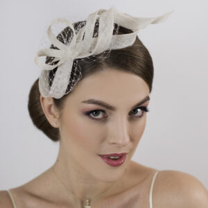 White modern and minimalist wedding fascinator.