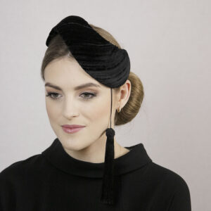 Black stylish velvet hat with removable tassel