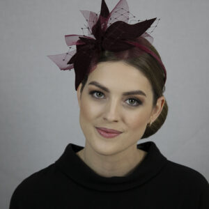 Burgundy red fascinator.